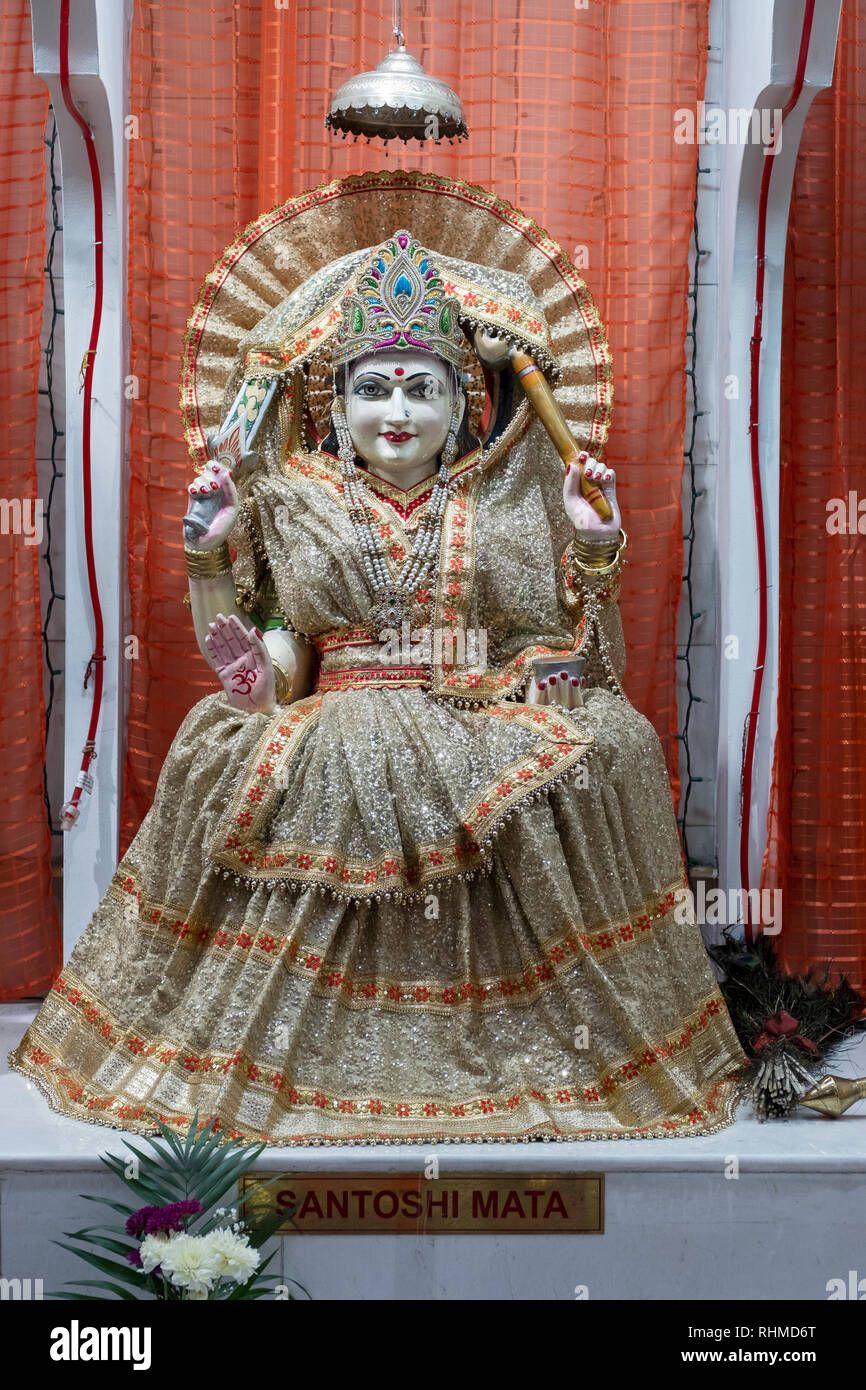 A statue of Santoshi Mata, A Hindu goddess. At the
