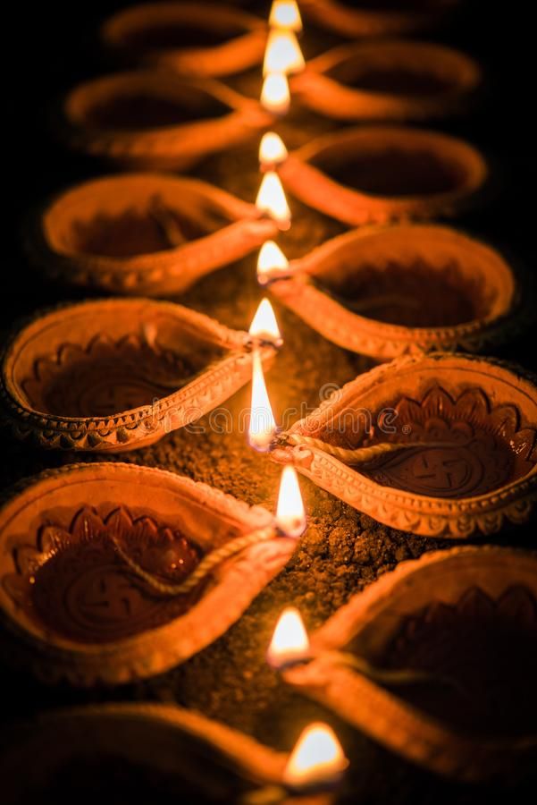 Happy Diwali Many Terracotta Diya Or Oil Lamps Arranged