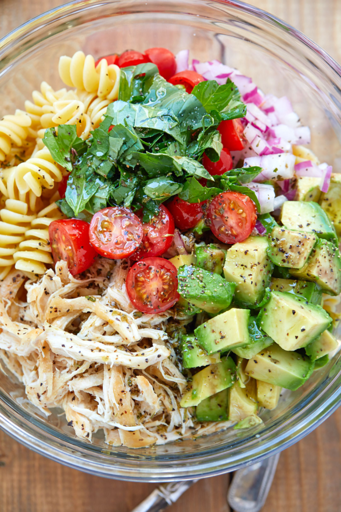 Healthy Chicken Pasta Salad With Avocado, Tomato, And Basil ﻿