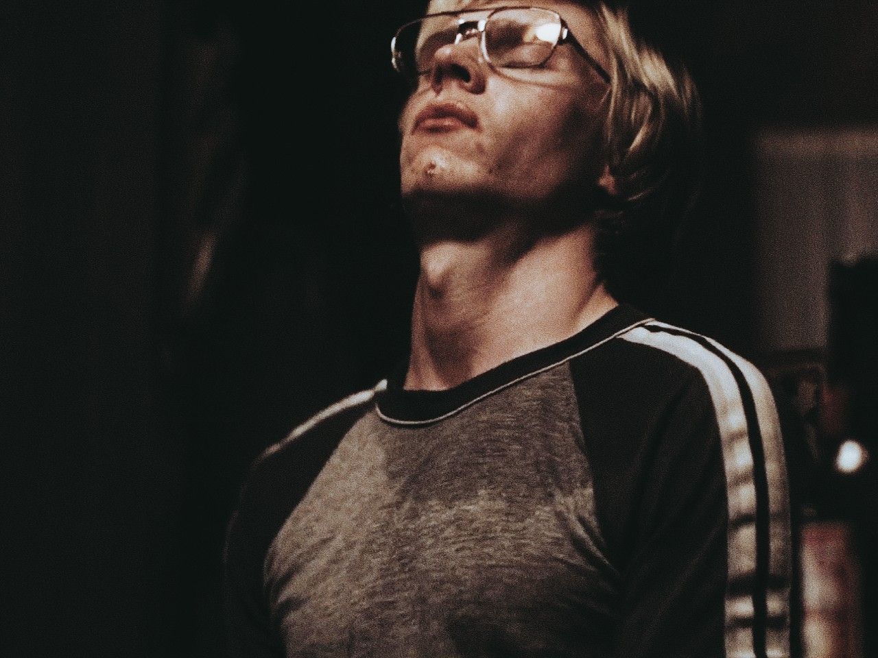 High resolution stills of Evan Peters as Jeffrey Dahmer. Images