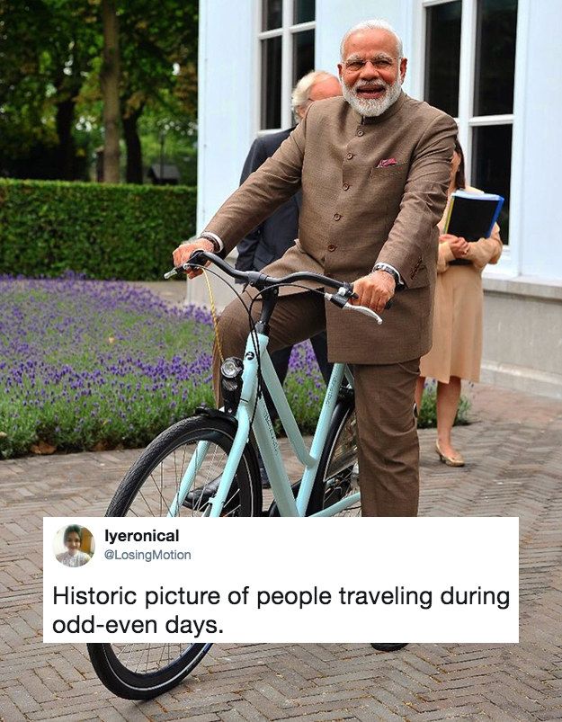 People Have Gone All Out Captioning These Photos Of Narendra Modi On A Cycle