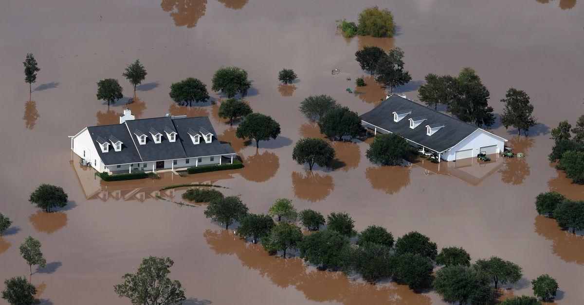 Sluggish U.S. flood buyback programs, rising waters, threaten homeowners